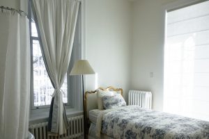 bedroom with washable curtains